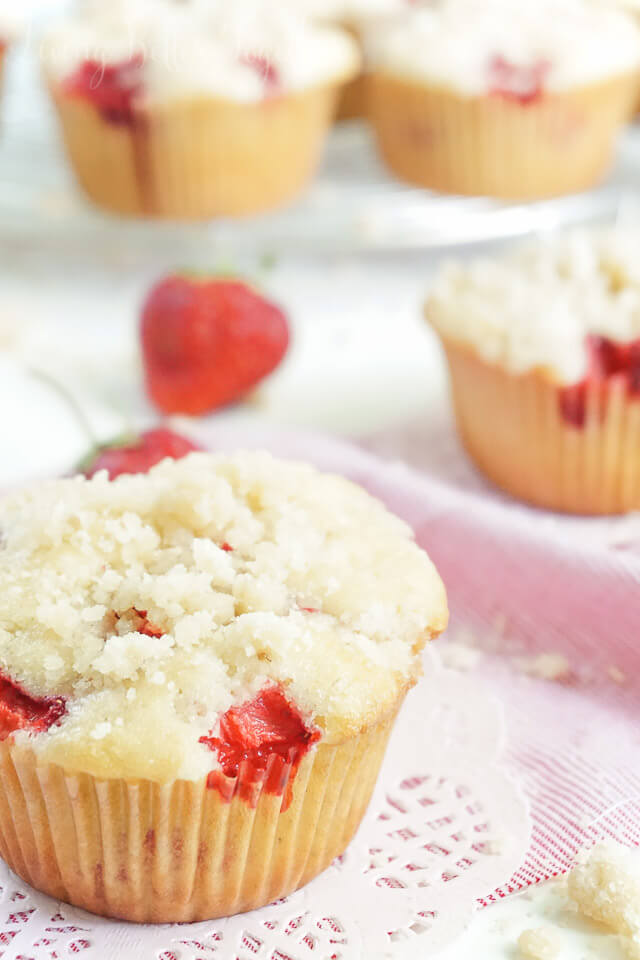 These Strawberry Coffee Cake Muffins are made with sweet fresh berries and topped with a delicious crumble!