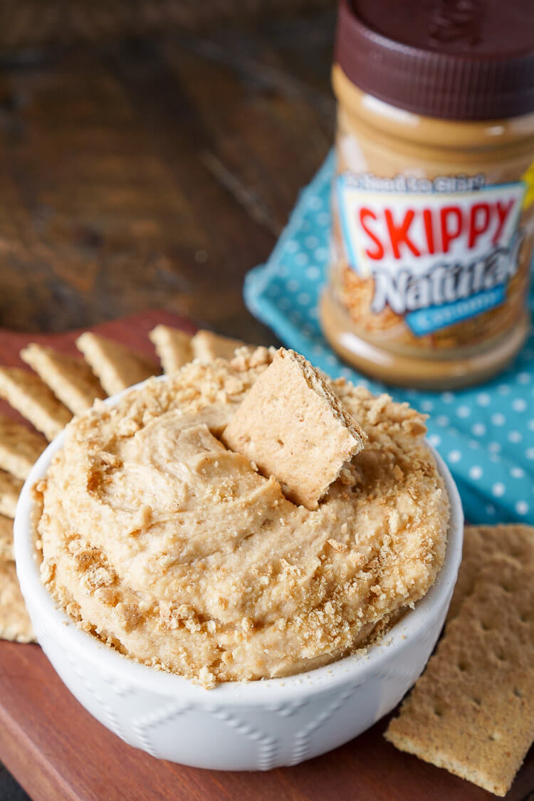This Peanut Butter Cheesecake Dip is a simple, no-bake dessert or snack everyone will love! Plus it's ready in just 5 minutes!