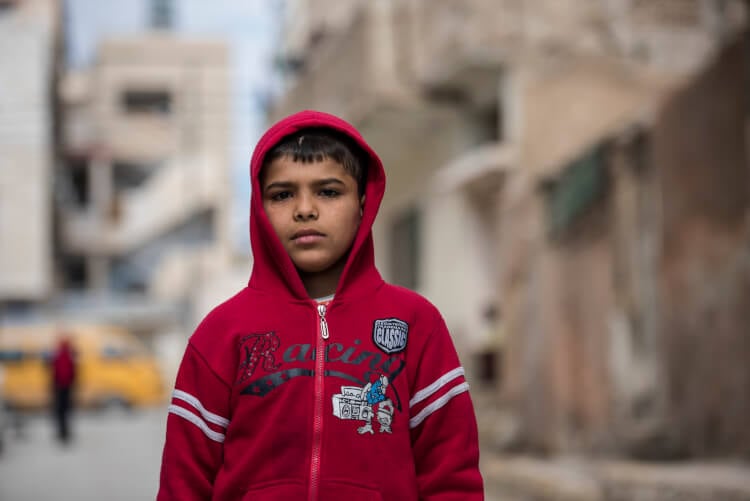Twelve-year-old, Shadi left Syria with his family several years ago when his neighborhood came under bombardment. They were also experiencing food shortages and his father was being threatened. They now live in an apartment in Zarqa, Jordan on February 8, 2016. Shortly after arriving in Jordan, Shadi learned his home in Syria was destroyed by barrel bombs, as well as, his bicycle which he misses very much. Shadi hopes to one day return to a safe Syria, but for now, he goes to school in Zarqa and enjoys studying math and science. He enjoys drawing and playing soccer. He hopes to one day be a doctor so he can help people. CARE provides psychosocial support to Shadi through providing him a safe recreational place to draw, play games and engage with professional case workers. photo/Carey Wagner for CARE