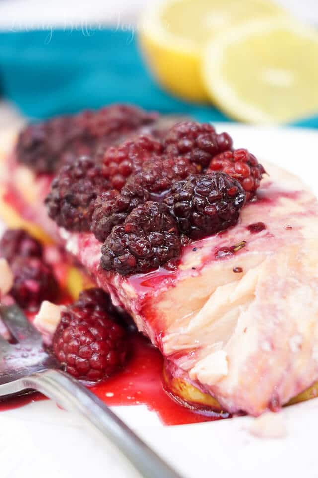 This gorgeous Blackberry Lemon Salmon is a light and flaky dinner recipe that's baked to perfection in just 30 minutes!