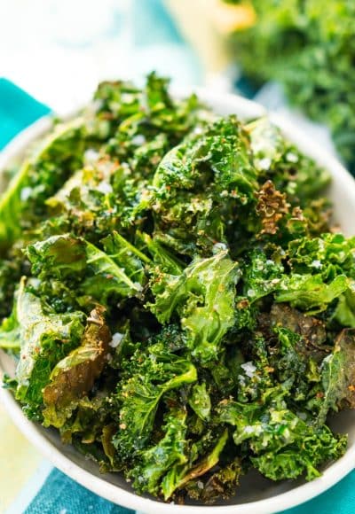Kale Chips are easy, healthy, and addictive! You'll love this simple, crunchy snack that's loaded with delicious flavor and nutrients! Only 50 calories and 1 Weight Watchers Smart Point per serving! 
