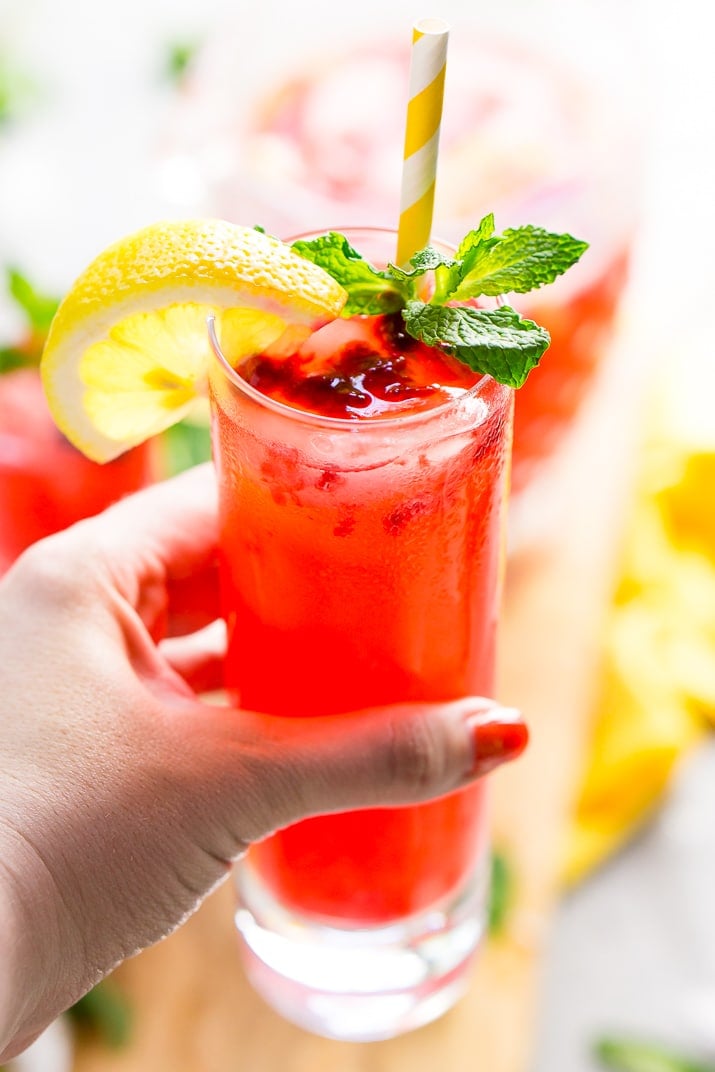 This Sparkling Raspberry Lemonade is a delicious and refreshing fruity drink that's made with raspberries, lemons, simple syrup, and club soda.