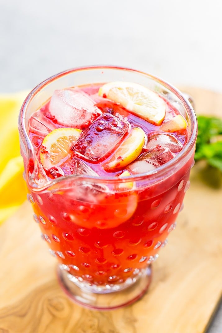 This Sparkling Raspberry Lemonade is a delicious and refreshing fruity drink that's made with raspberries, lemons, simple syrup, and club soda.