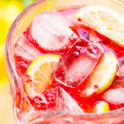 This Sparkling Raspberry Lemonade is a delicious and refreshing fruity drink that's made with raspberries, lemons, simple syrup, and club soda.