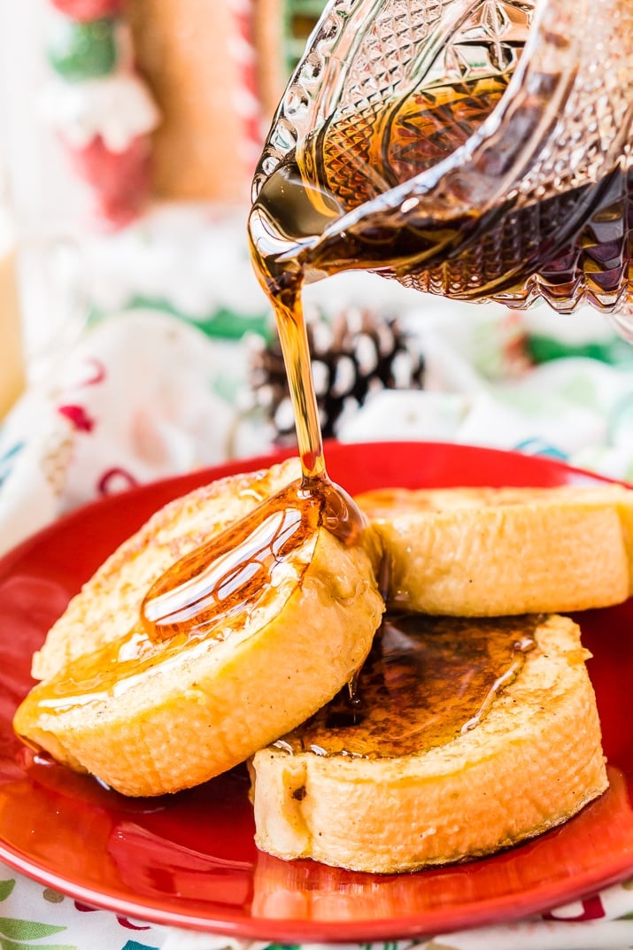 This Eggnog French Toast is dipped in a mixture of eggnog, eggs, rum, vanilla, and nutmeg before it's cooked to perfection and slathered in syrup for a delicious holiday breakfast!