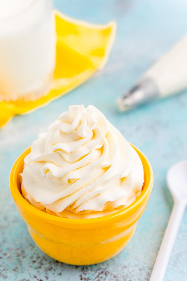 This Cream Cheese Whipped Cream is deliciously creamy and tangy topping for desserts, milkshakes, hot chocolate, and more! Made with just 4 ingredients and ready in 5 minutes!