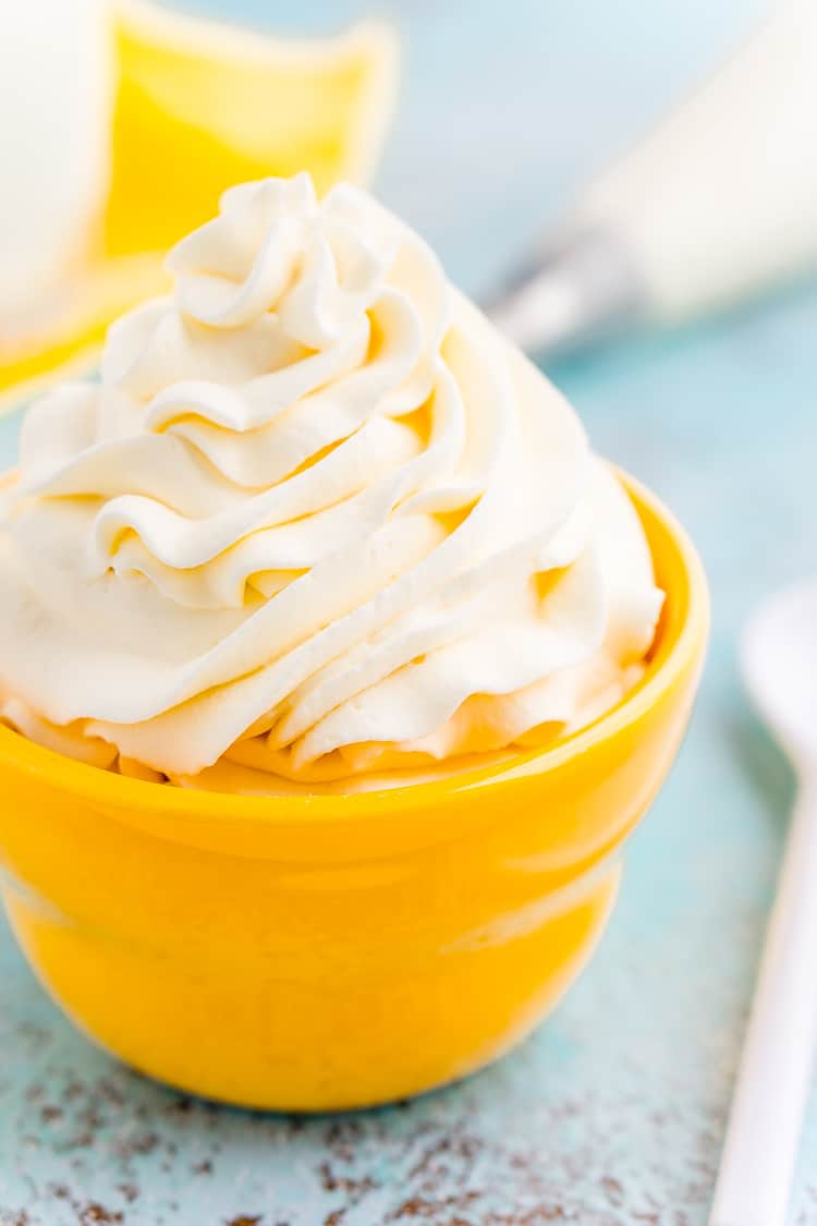 This Cream Cheese Whipped Cream is deliciously creamy and tangy topping for desserts, milkshakes, hot chocolate, and more! Made with just 4 ingredients and ready in 5 minutes!