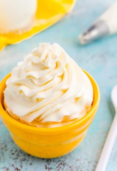 This Cream Cheese Whipped Cream is deliciously creamy and tangy topping for desserts, milkshakes, hot chocolate, and more! Made with just 4 ingredients and ready in 5 minutes!