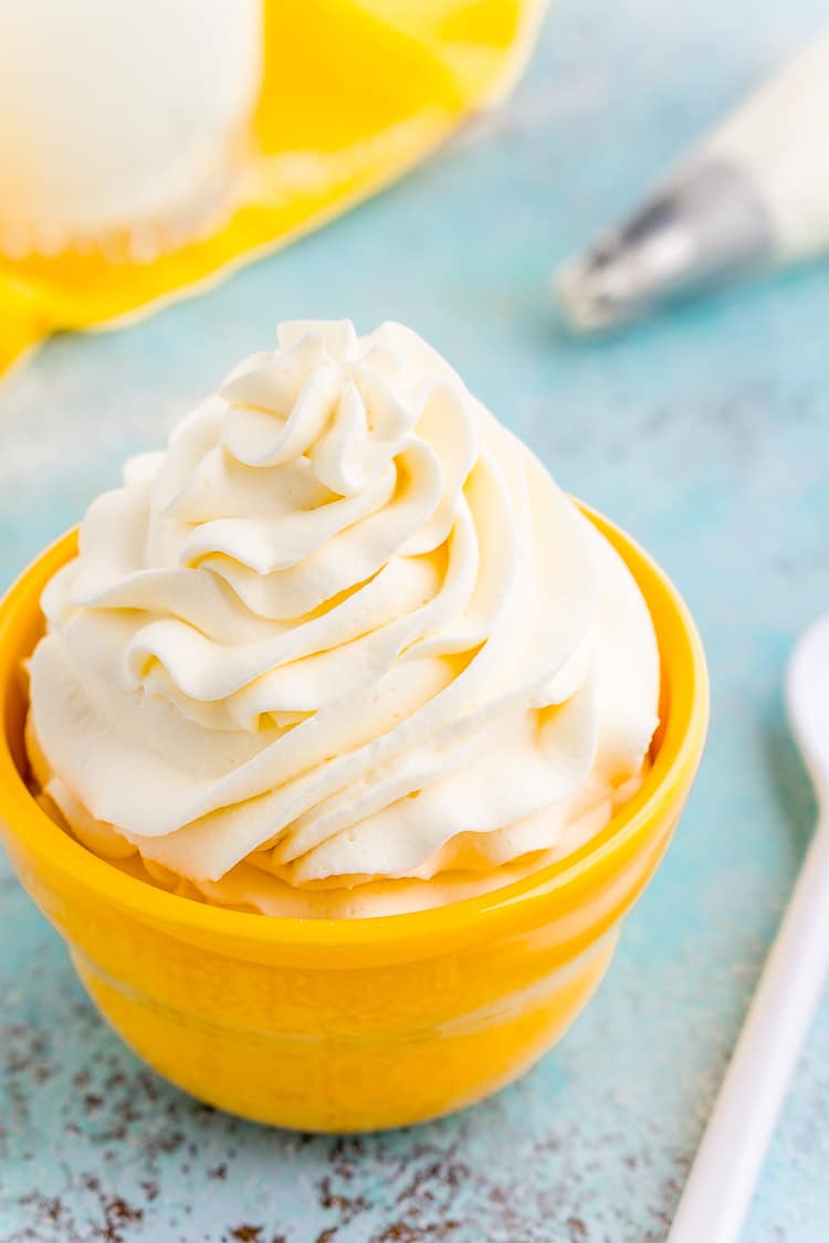 This Cream Cheese Whipped Cream is deliciously creamy and tangy topping for desserts, milkshakes, hot chocolate, and more! Made with just 4 ingredients and ready in 5 minutes!