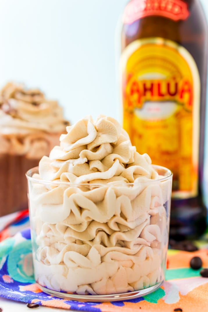 This Kahlua Whipped Cream recipe is perfect for topping hot chocolate, milkshakes, mudslides, and more! A delicious and fluffy whipped cream laced with coffee liqueur!