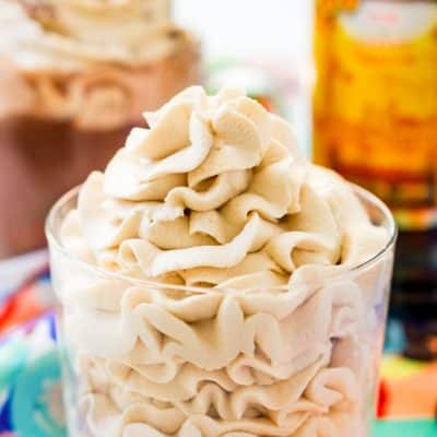 This Kahlua Whipped Cream recipe is perfect for topping hot chocolate, milkshakes, mudslides, and more! A delicious and fluffy whipped cream laced with coffee liqueur!