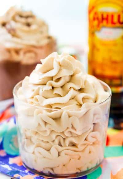 This Kahlua Whipped Cream recipe is perfect for topping hot chocolate, milkshakes, mudslides, and more! A delicious and fluffy whipped cream laced with coffee liqueur!