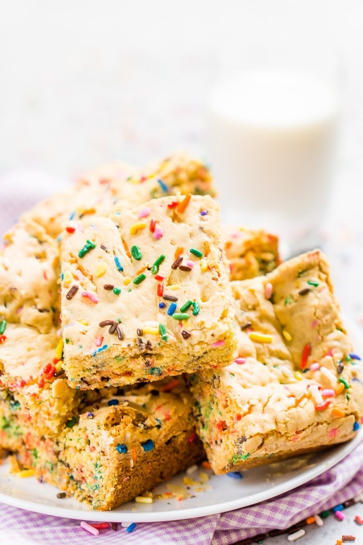 These Birthday Cake Blondies are made with an adapted yellow cake box mix and are so easy to make! They're sweet and fun and loaded with sprinkles!
