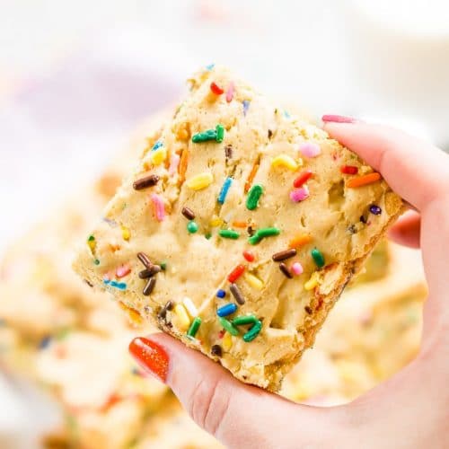 These Birthday Cake Blondies are made with an adapted yellow cake box mix and are so easy to make! They're sweet and fun and loaded with sprinkles!