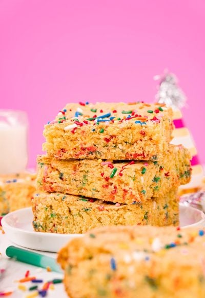 Straight on shot of a stack of three cake mix brownies.