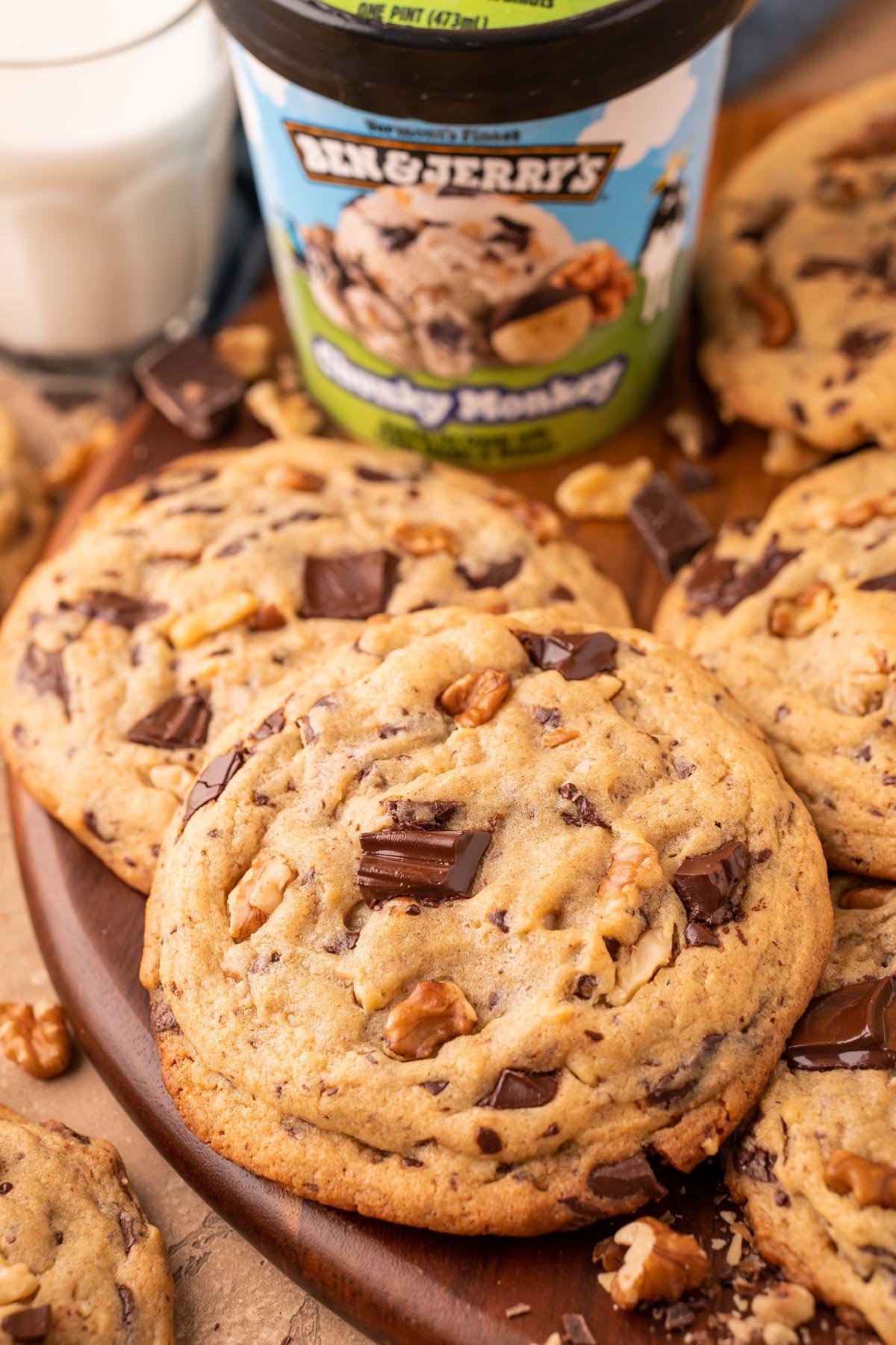 Close up photo of Chunky Monkey Pudding Cookies on a board. 