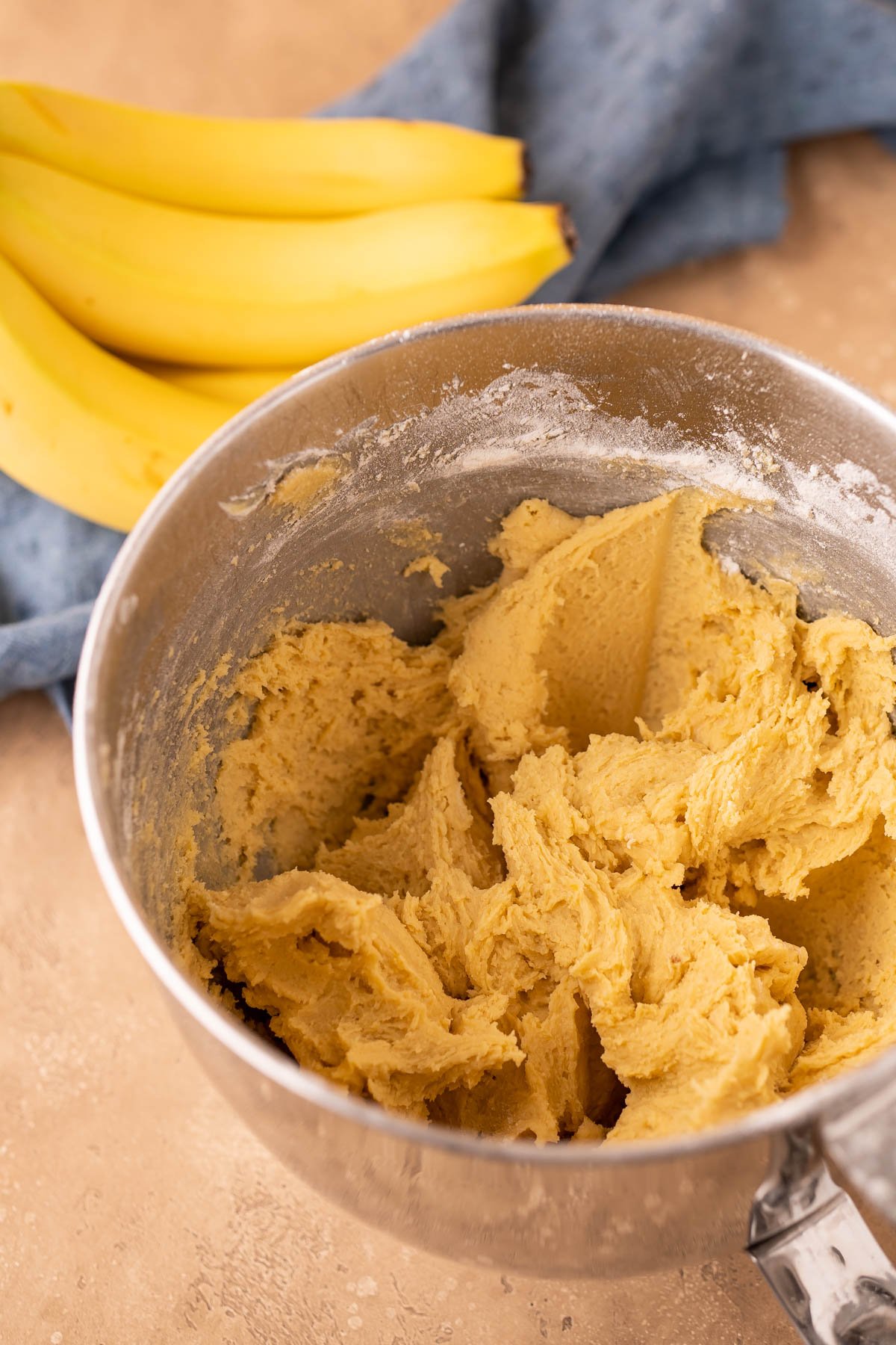 Base cookie dough mixture in a stand mixer bowl.