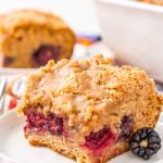 A sweet brown sugar coffee cake with a layer of fresh wild blackberries that are bursting with flavor!