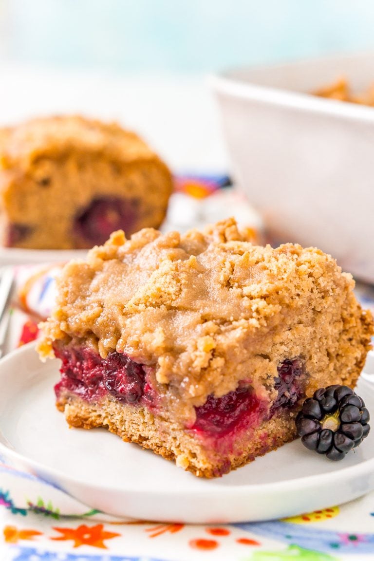 A sweet brown sugar coffee cake with a layer of fresh wild blackberries that are bursting with flavor!