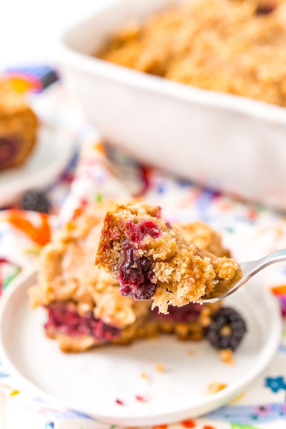 Forkfull of blackberry coffee cake