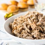 Whiskey Honey Pulled Pork is slow cooked to perfection and loaded with flavors of sweet honey, tart cider, and whiskey for a delicious meal!