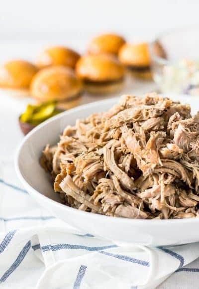 Whiskey Honey Pulled Pork is slow cooked to perfection and loaded with flavors of sweet honey, tart cider, and whiskey for a delicious meal!