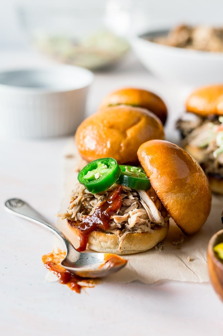 Whiskey Honey Pulled Pork is slow cooked to perfection and loaded with flavors of sweet honey, tart cider, and whiskey for a delicious meal!