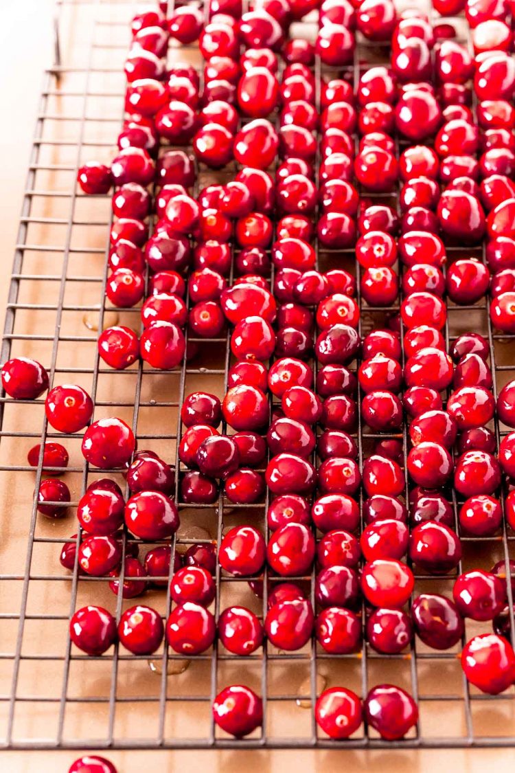 Cranberries on a wire rack.