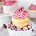 White Chocolate Cranberry Cupcake in a bowl of sugar coated Cranberries