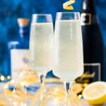 French 75 is a classic cocktail that combines bright citrus with the earthy notes of gin and the sparkle of champagne. A delicious drink recipe for parties, New Year's Eve, brunch, bridal showers and more!