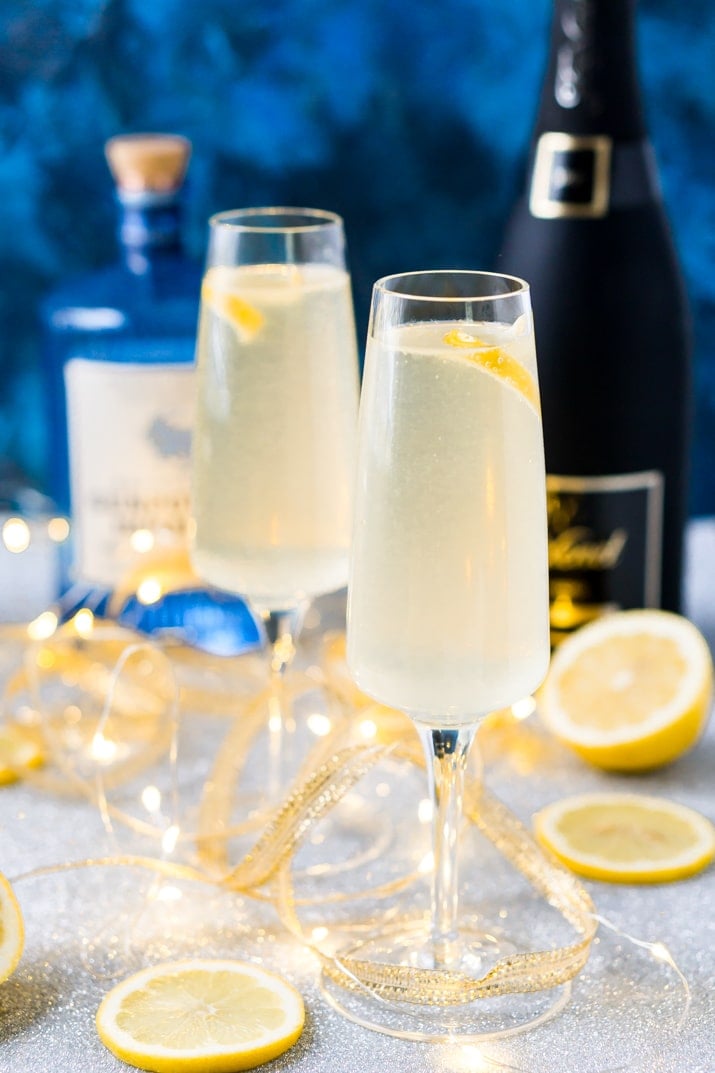 French 75 is a classic cocktail that combines bright citrus with the earthy notes of gin and the sparkle of champagne. A delicious drink recipe for parties, New Year's Eve, brunch, bridal showers and more!