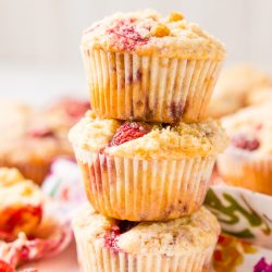 Raspberry Muffins loaded with juicy red raspberries and topped with an irresistible sugar crumble.