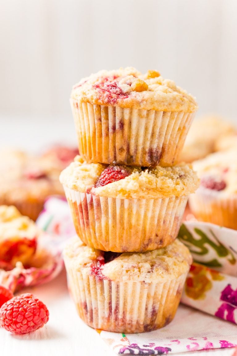 Raspberry Muffins loaded with juicy red raspberries and topped with an irresistible sugar crumble.