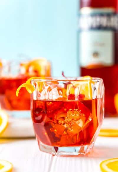 This Boulevardier is an Americanized version of the classic Negroni Cocktail, trading in the gin for rye whiskey. It's a simple and sophisticated drink made with whiskey, Campari, and sweet vermouth served on the rocks.