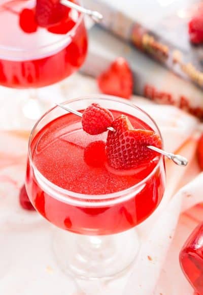 This Harry Potter Amortentia Cocktail is made with cranberry juice, vodka, grenadine and pearl dust! It's the perfect sweet and shimmery love potion to serve up for Valentine's Day or any other special occasion.