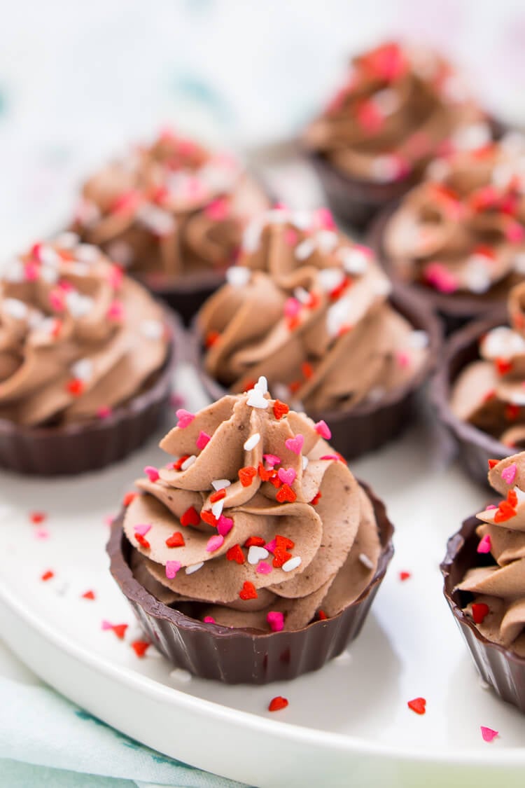 These 4-Ingredient Chocolate Mousse Cups are about as easy as it gets! They're ready in 10 minutes and there's no baking required which makes them a perfect last minute dessert!