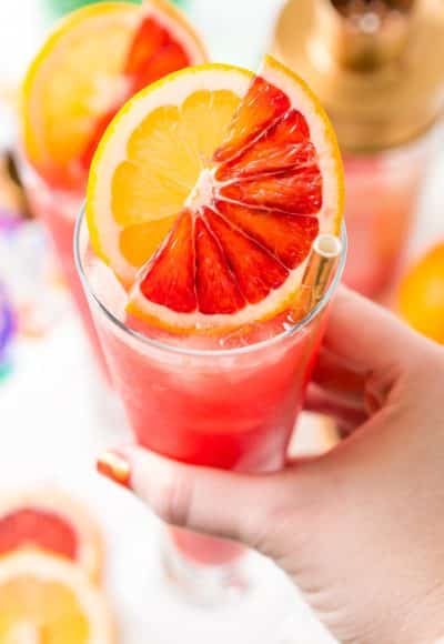  This Blood Orange Cocktail made with blood oranges, gin, lemon juice, citrus bitters, Cointreau, and ice. It's a sexy, fun, and tasty pink drink I call a Citrus Tango!