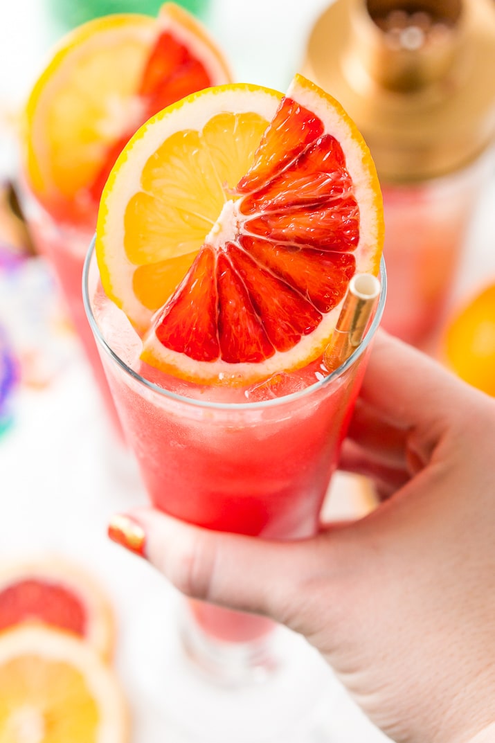 Hand Holding Blood Orange Cocktail