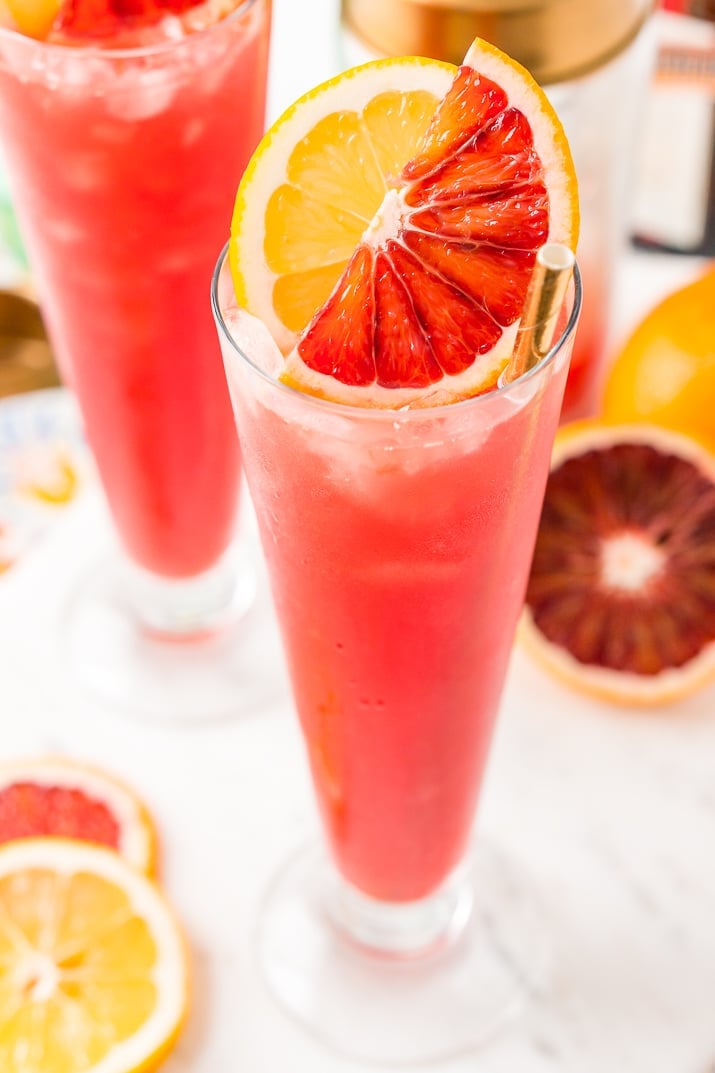  This Blood Orange Cocktail made with blood oranges, gin, lemon juice, citrus bitters, Cointreau, and ice. It's a sexy, fun, and tasty pink drink I call a Citrus Tango!