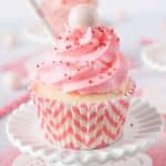 These Strawberry Milkshake Cupcakes have a vanilla malt base and are topped with a strawberry milk whipped cream frosting, sprinkles, and a whopper! Make them for an instant trip down memory lane.