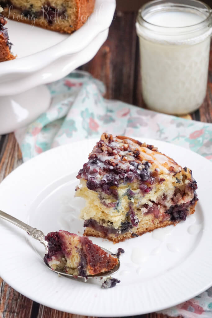 This Triple Berry Coffee Cake is loaded with strawberries, blueberries, and blackberries then finished off with chopped pecans and a simple icing.