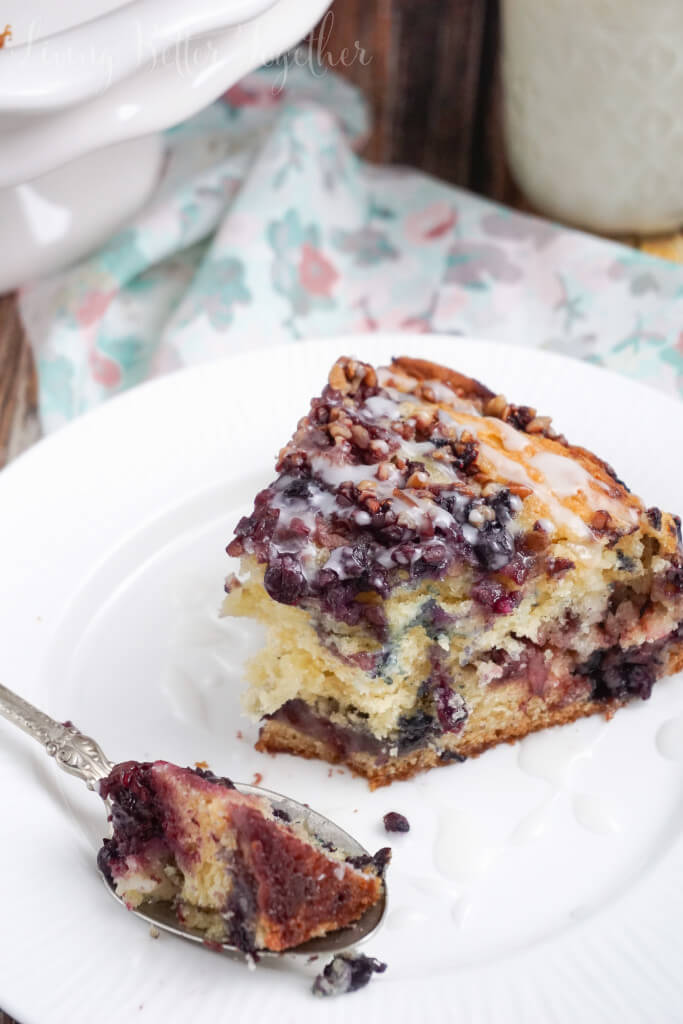 This Triple Berry Coffee Cake is loaded with strawberries, blueberries, and blackberries then finished off with chopped pecans and a simple icing.