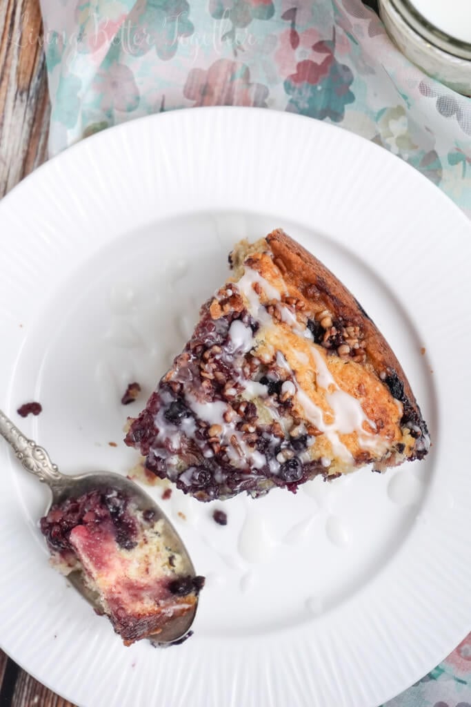 This Triple Berry Coffee Cake is loaded with strawberries, blueberries, and blackberries then finished off with chopped pecans and a simple icing.
