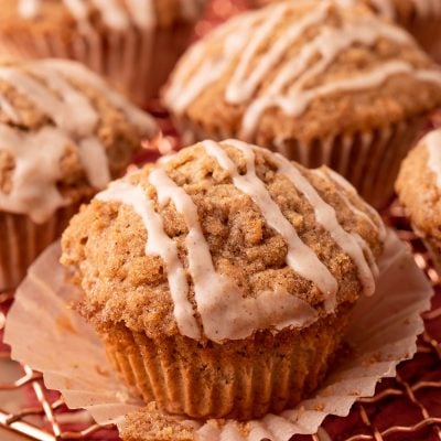 Close up of vanilla chai muffins on a copper wire rack.