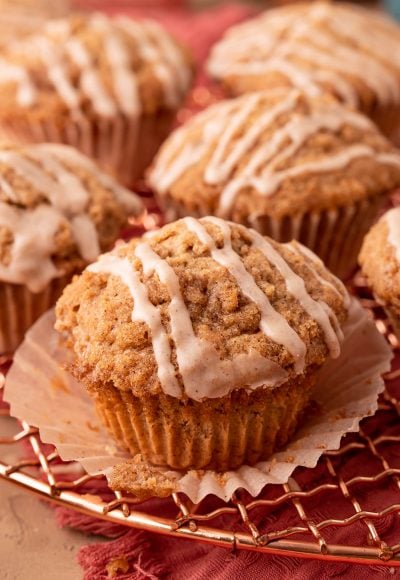 Close up of vanilla chai muffins on a copper wire rack.