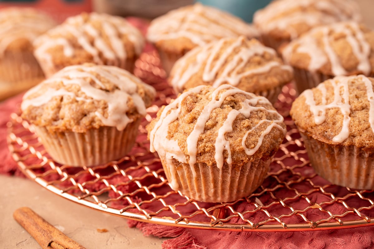 Close up of vanilla chai muffins on a copper wire rack.