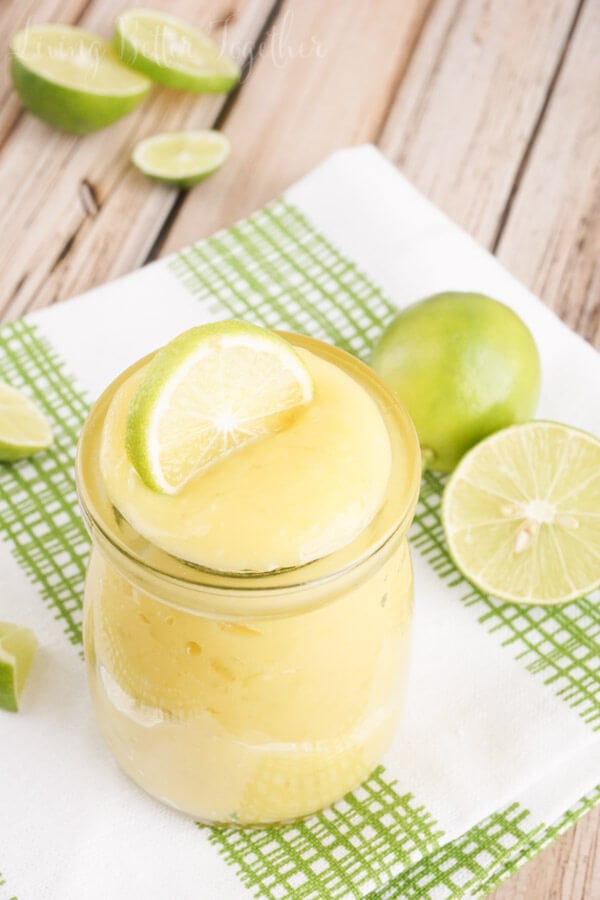 This simple and easy Homemade Key Lime Curd recipe is just the thing to fill your cupcakes with, slather on your toast, or eat straight out of the jar!