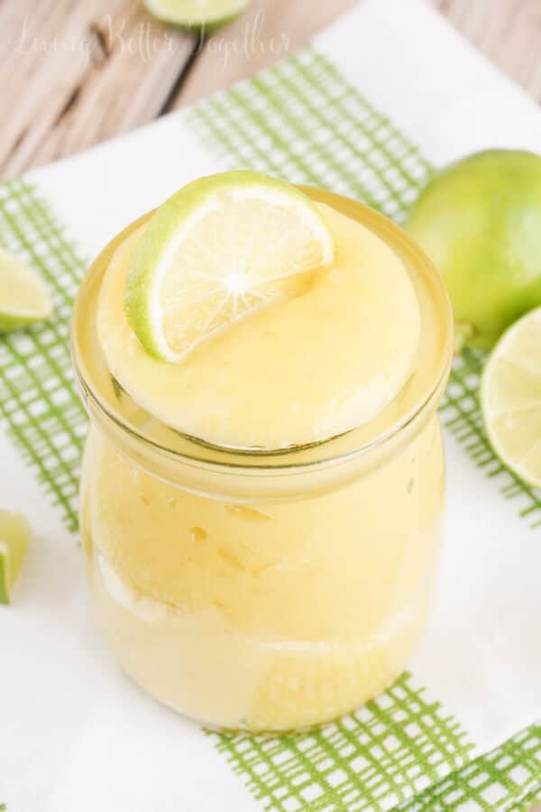 This simple and easy Homemade Key Lime Curd recipe is just the thing to fill your cupcakes with, slather on your toast, or eat straight out of the jar!