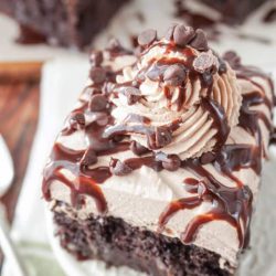 This Mocha Poke Cake is rich, moist, chocolate, and topped with a whipped coffee frosting.