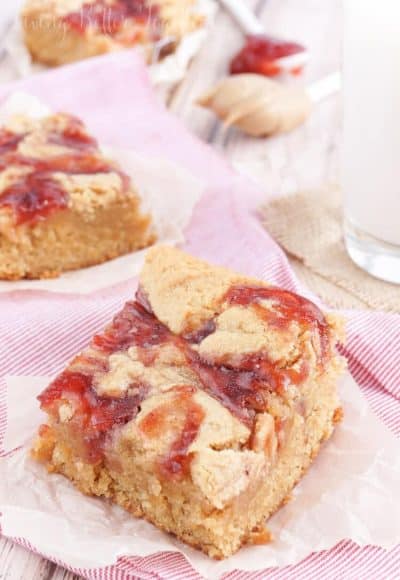 These Peanut Butter and Jelly Blondies are an easy dessert the whole family will love!